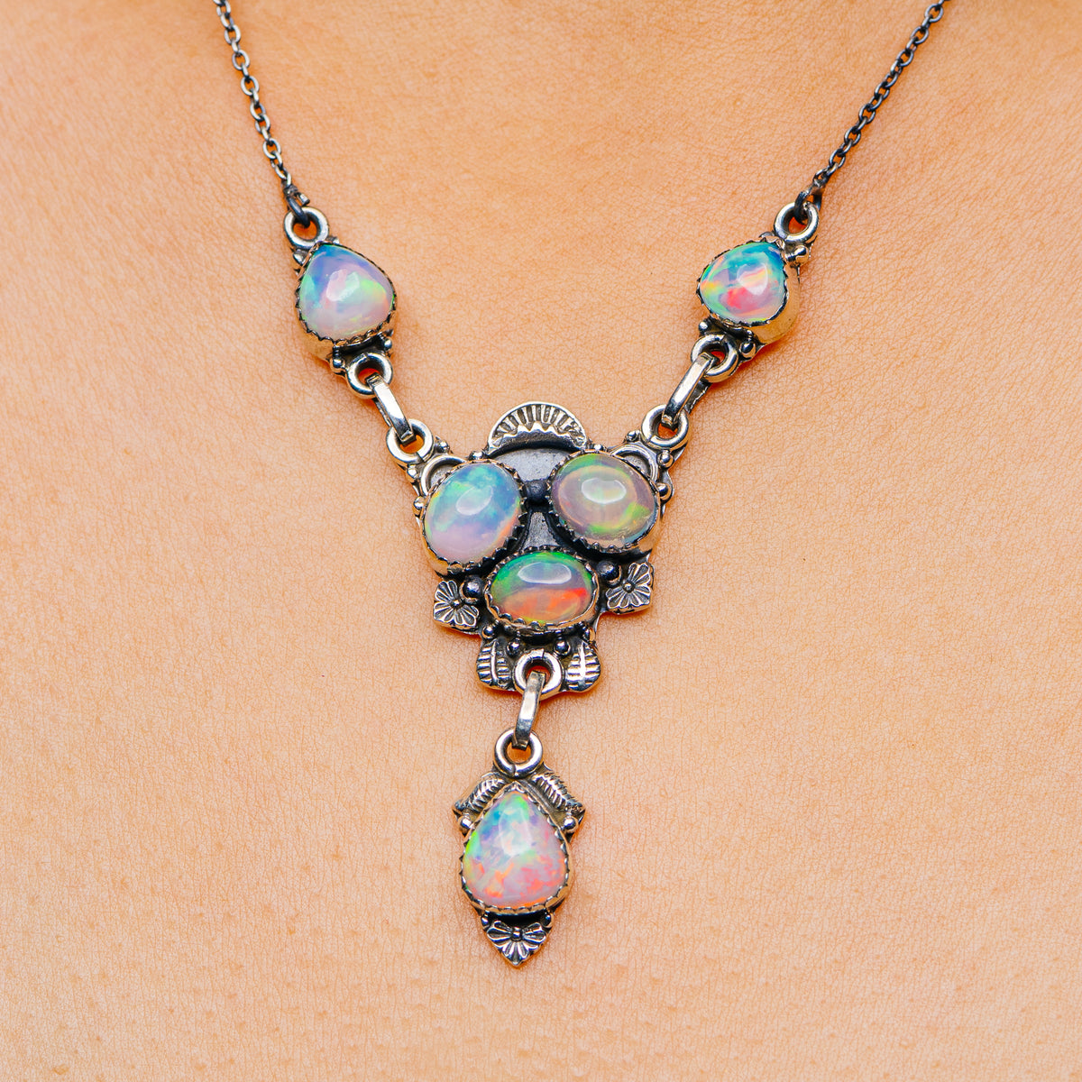 Sterling silver opal necklace with multicolor oval opal drops and ornate links