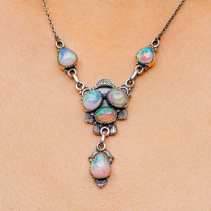 Sterling silver opal necklace with multicolor oval opal drops and ornate links