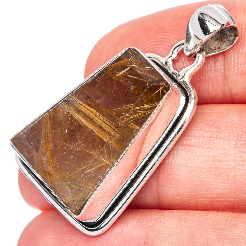 Rutile pendant with rectangular golden-brown stone in polished silver bezel