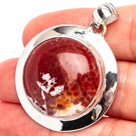 Sterling silver round fire crab agate pendant with red and amber marbled stone