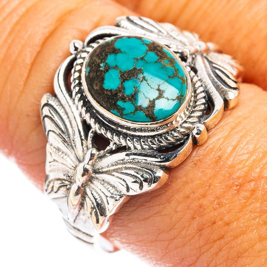 Turquoise oval cabochon butterfly ring, .925 sterling silver setting with floral engraving