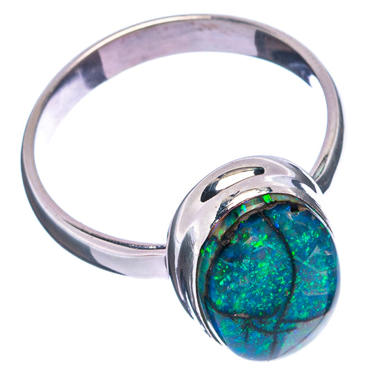 Sterling silver ring with raised oval opal cabochon, green and blue mottled color