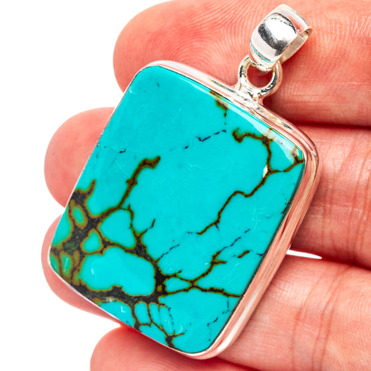 Sterling silver turquoise pendant with rectangular stone, blue with dark matrix pattern
