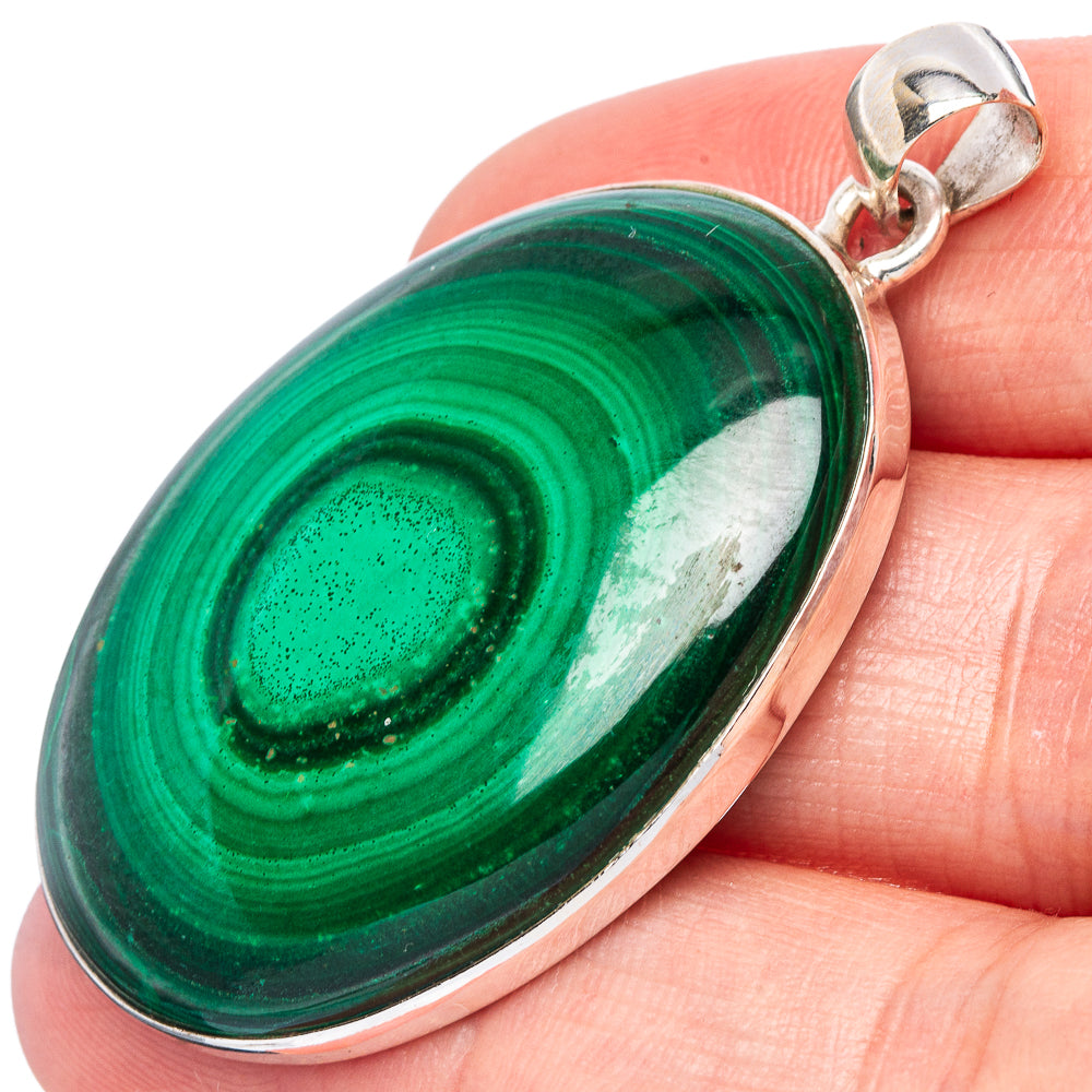 Malachite pendant in oval green stone with 925 sterling silver bezel and bail