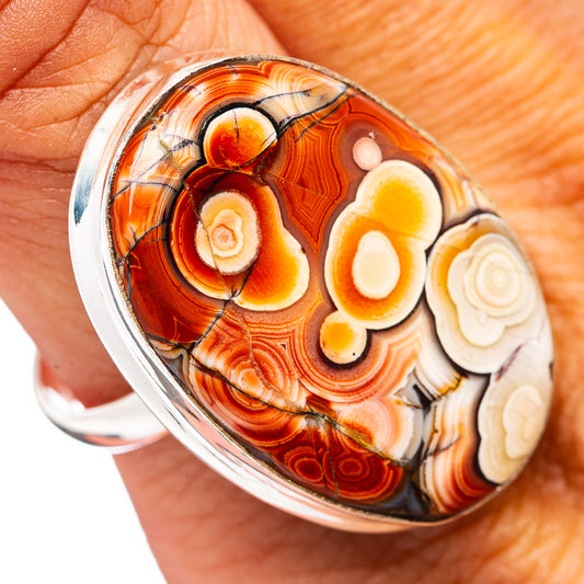 Sterling silver ring with oval crazy lace agate cabochon, red and cream floral pattern