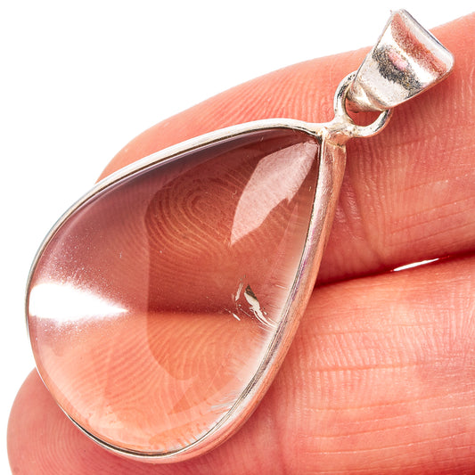 Silver plated smoky quartz teardrop pendant with metal bail, close-up