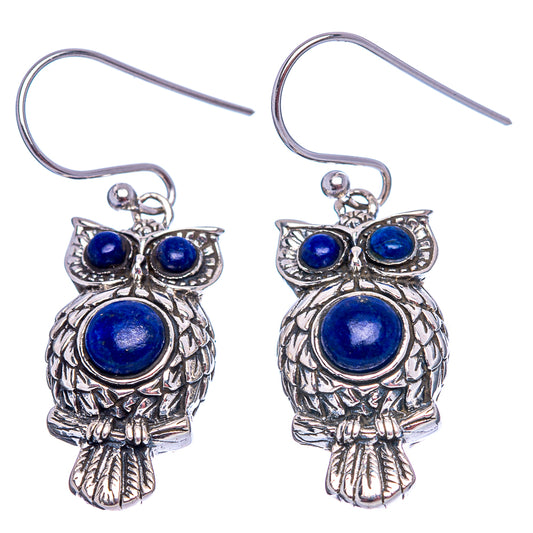 Sterling silver owl dangle earrings with four lapis lazuli blue cabochon stones