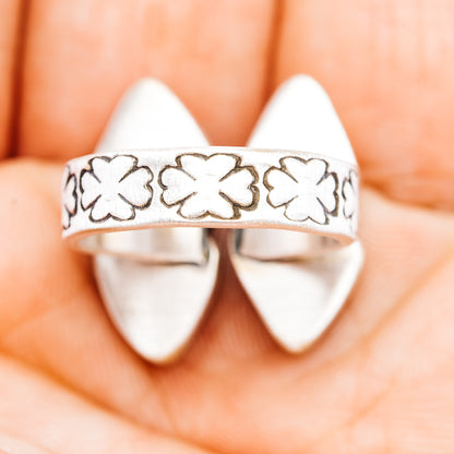 Southwestern sterling silver ring band with clover cutout pattern and open top