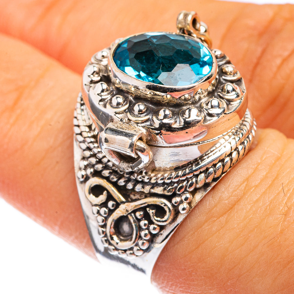 Sterling silver filigree ring with large oval blue gemstone top