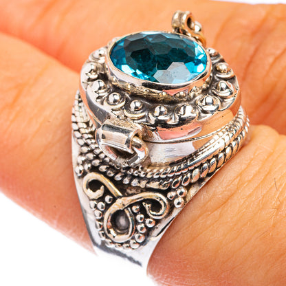 Sterling silver filigree ring with large oval blue gemstone top