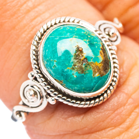Oval turquoise cabochon ring in .925 sterling silver with bead and scroll settings