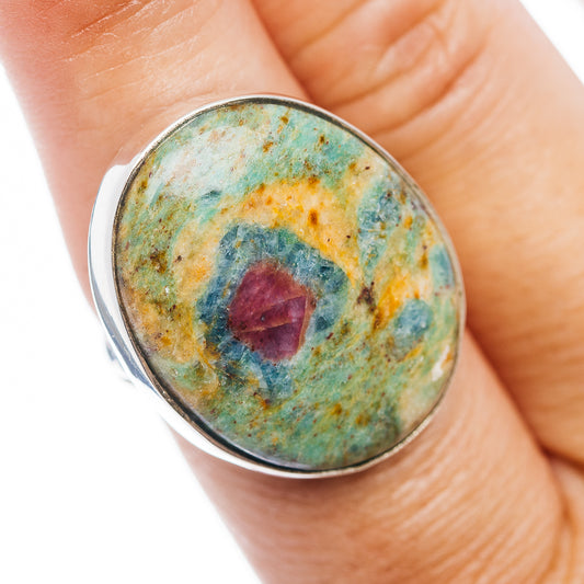 Oval sterling silver ring with green-blue fuchsite stone and small red center cabochon