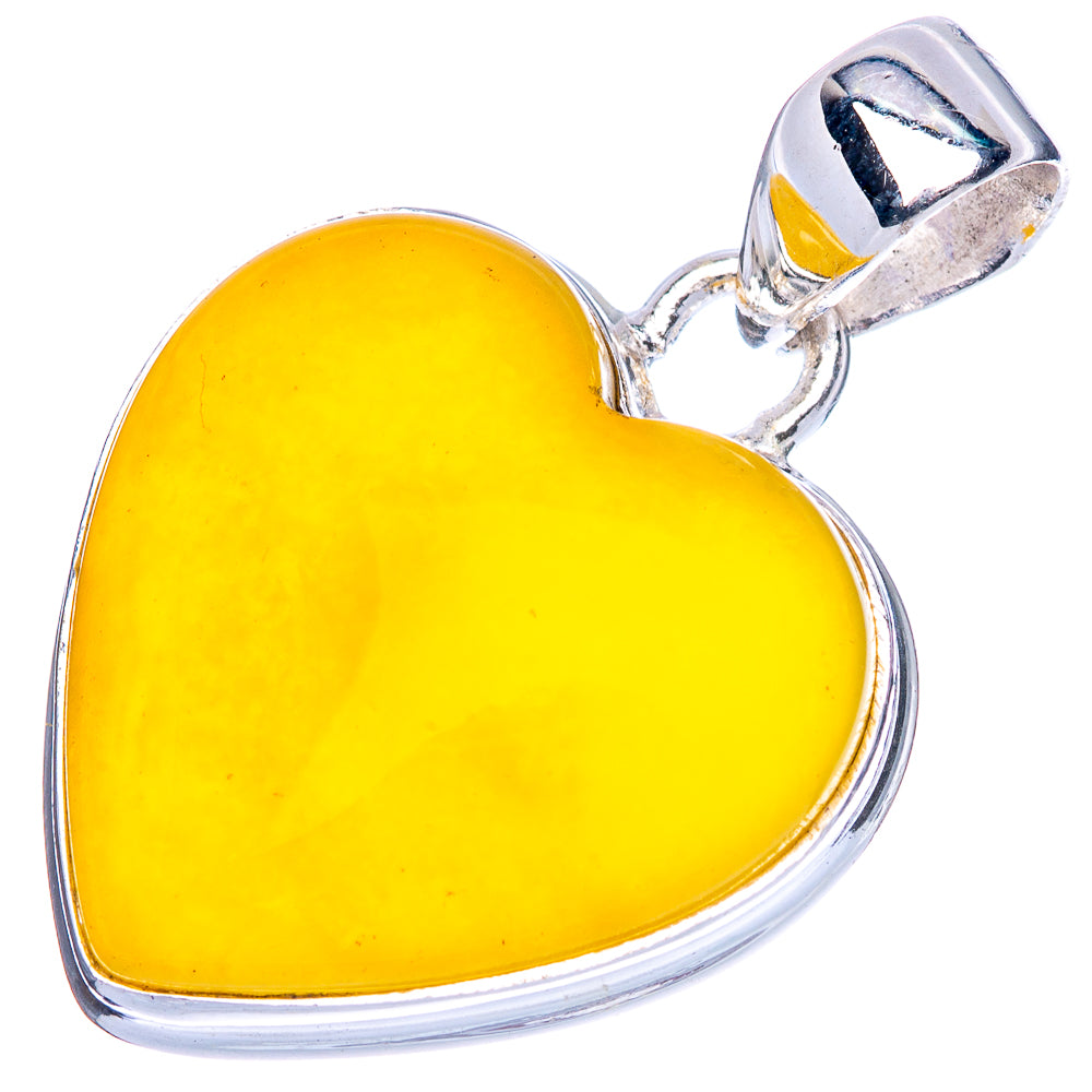 Yellow amber heart pendant in 925 sterling silver with cabochon and bail loop