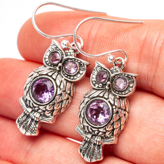Sterling silver owl drop earrings with purple amethyst crystal accents