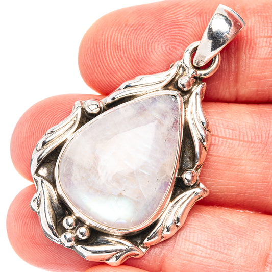 Teardrop moonstone pendant in .925 sterling silver, ornate floral frame