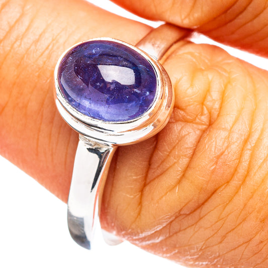 Sterling silver tanzanite ring with oval blue gemstone, polished band