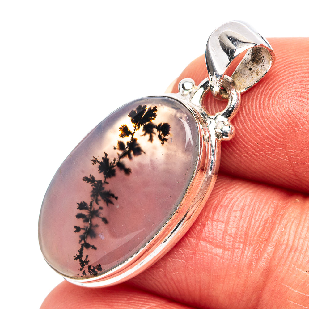 Sterling silver dendritic agate pendant with oval pink stone and black tree-like inclusions