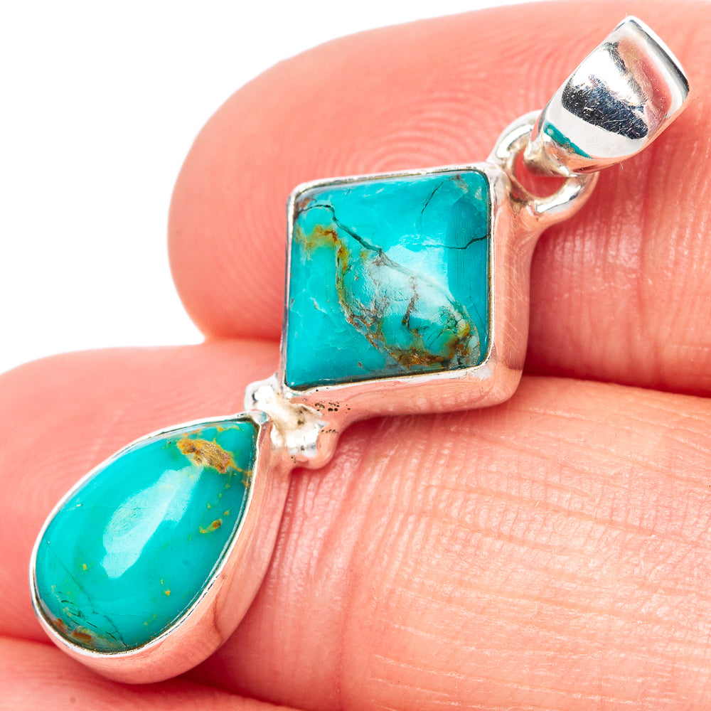 Kingman turquoise pendant in 925 sterling silver, rectangular center with oval drop