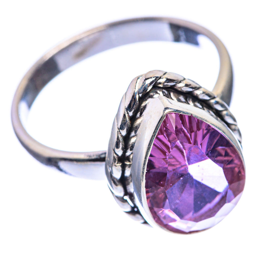 Oval faceted purple alexandrite-style gemstone ring with rope-twist silver band