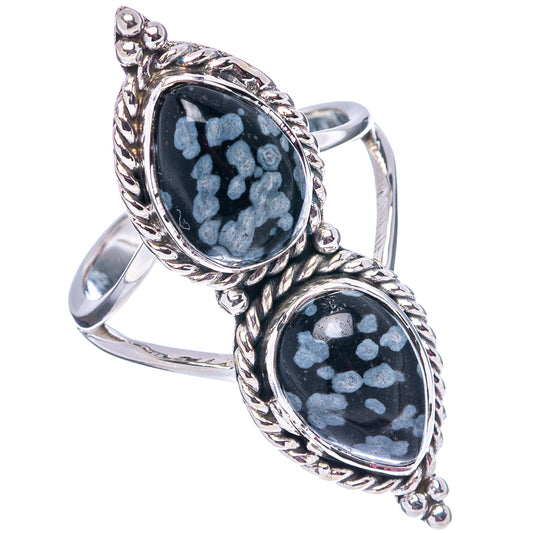 Sterling silver ring with two oval dark cabochons and blue snowflake motif, size 7.75