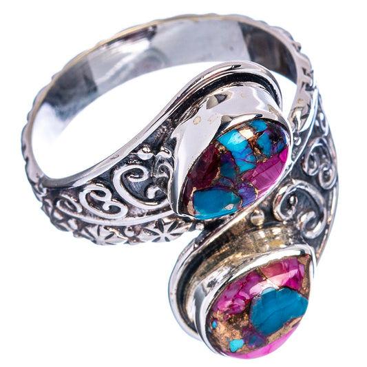 Sterling silver statement ring with oval pink and turquoise stone inlays, side view