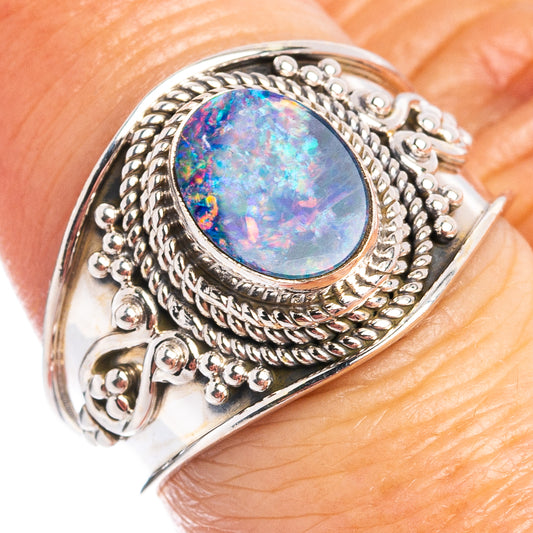 Sterling silver opal doublet ring with oval blue-pink iridescent stone