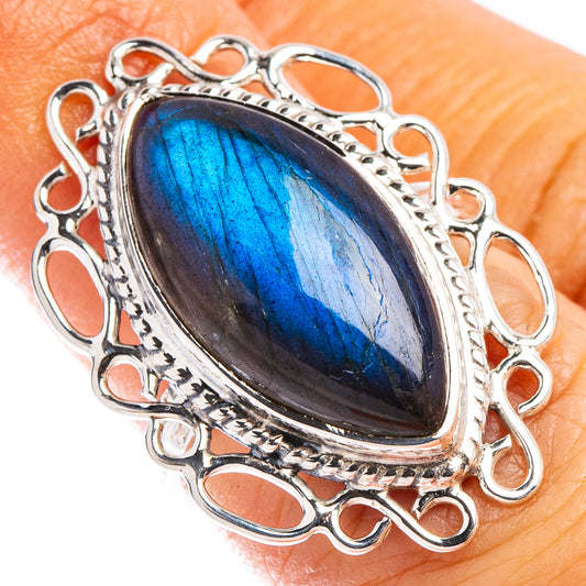 Sterling silver labradorite ring with oval blue flash gemstone, ornate openwork setting