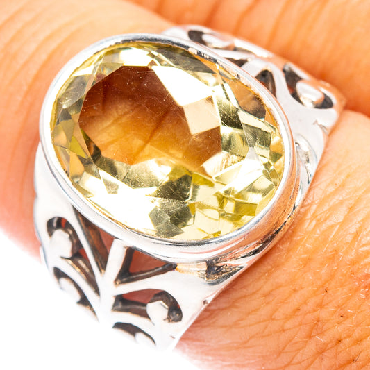 Sterling silver lemon quartz oval ring, size 8.25, detailed filigree setting.