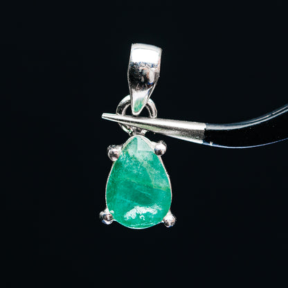 Sterling silver pendant with pear-shaped green emerald and 4-prong setting