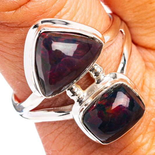 Triangular black opal sterling silver ring with raised bezel and split shoulders