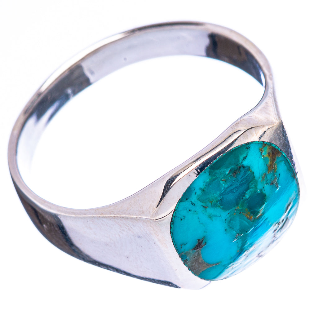 Sterling silver turquoise cabochon ring with oval bezel-set stone on metal band