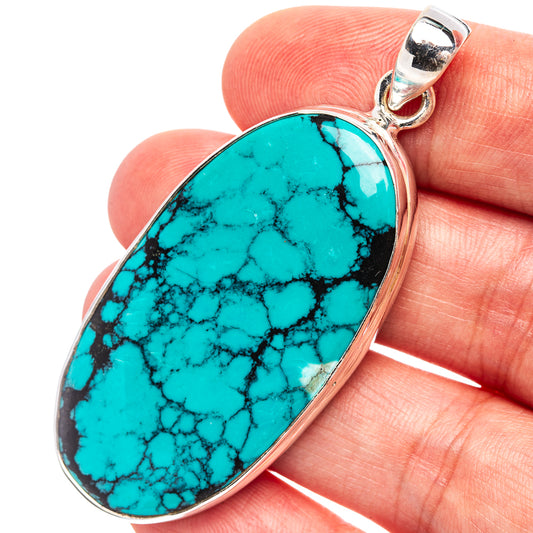 Oval turquoise pendant with .925 sterling silver bail and bezel