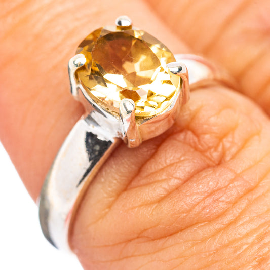 Size 6.5 sterling silver citrine ring with oval yellow gemstone and four prongs