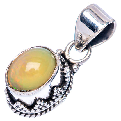 Ethiopian opal pendant with oval opal cabochon and detailed silver drop-style setting