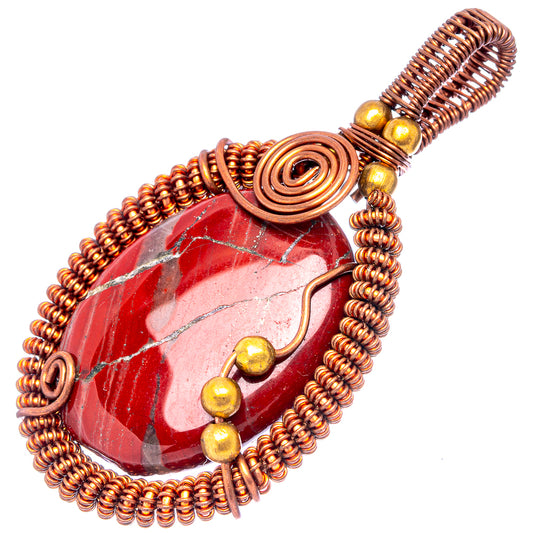 Red jasper wire-wrap pendant with copper spiral and bead accents