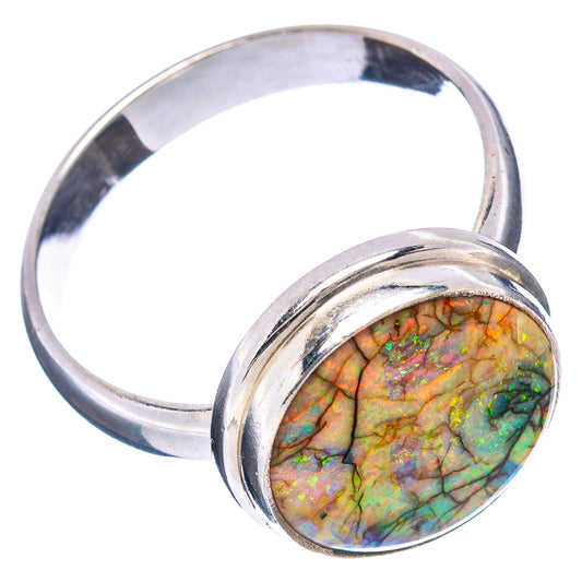 Sterling silver oval opal ring with bezel-set iridescent gemstone