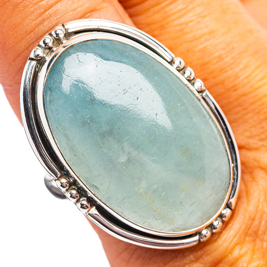 Oval aquamarine gemstone ring in .925 sterling silver with double bezel and bead details