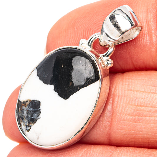 Oval white buffalo turquoise pendant in .925 sterling silver bezel, top bail view