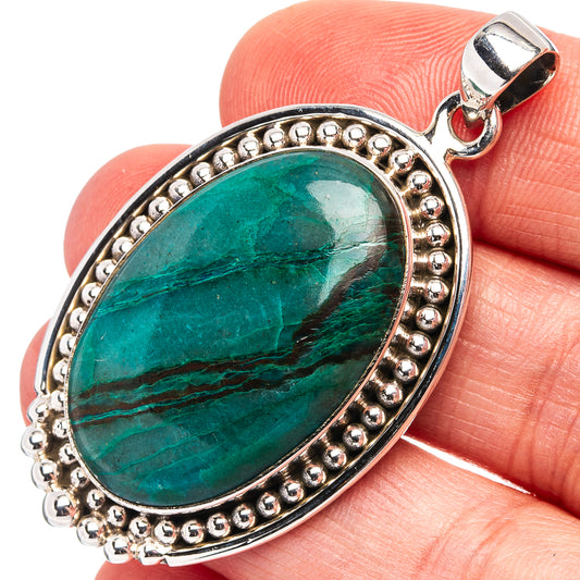 Chrysocolla oval pendant in .925 sterling silver with round bead border and clasp bail
