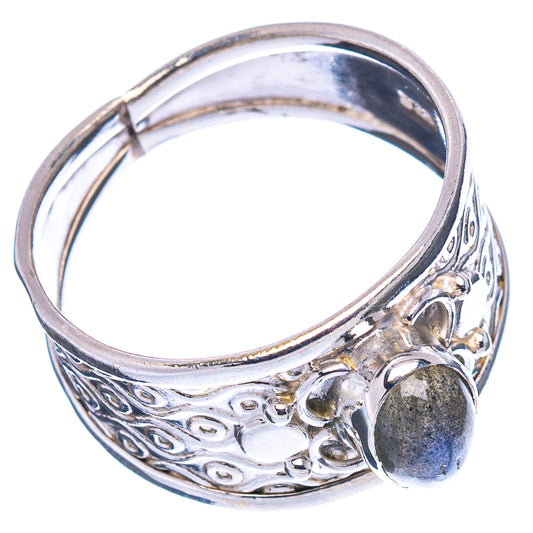 Sterling silver band ring with detailed filigree and oval labradorite cabochon
