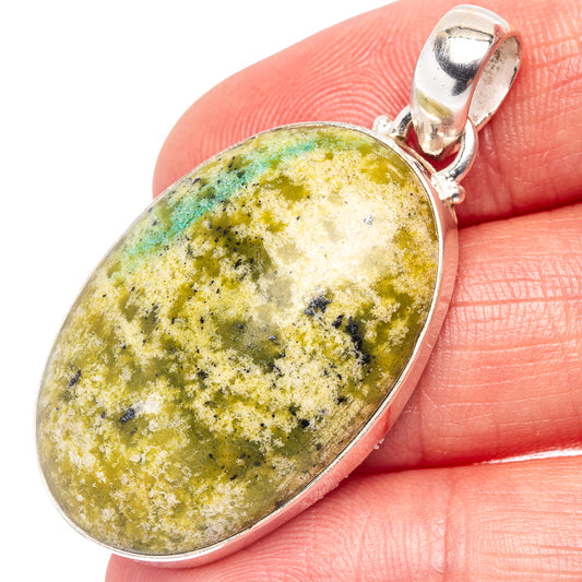Oval lizardite gemstone pendant in .925 sterling silver with polished bail