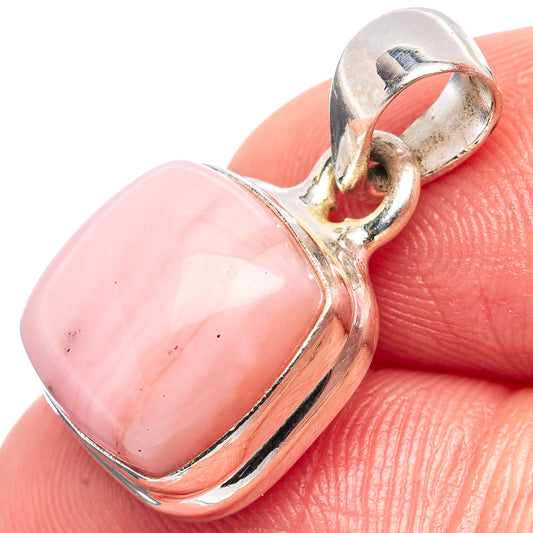 Pink opal oval pendant in 925 sterling silver bezel with bail, close-up view
