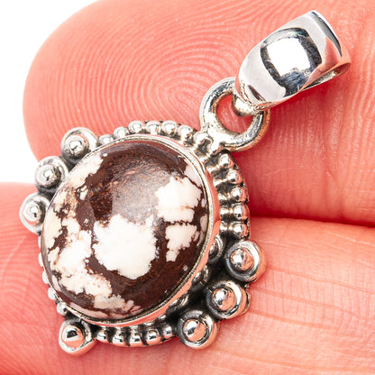 Sterling silver oval jasper pendant with brown-and-white marbled stone and textured round setting