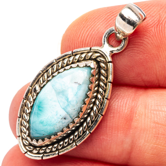 Oval larimar stone pendant with ornate .925 sterling silver bezel and bail