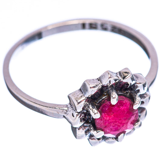 Sterling silver size 6 red gemstone ring, rounded band with ornate prong setting.