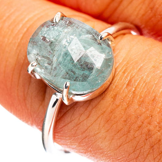 Faceted aquamarine gemstone ring with oval stone and polished 925 sterling silver band