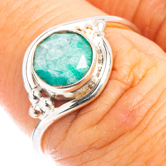 Sterling silver ring with oval green sillimanite gemstone in a bezel setting