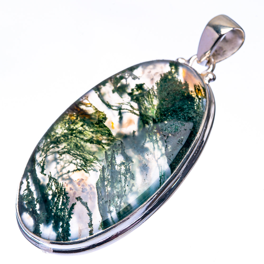 Teardrop sterling silver pendant with moss agate cabochon, white base with green moss