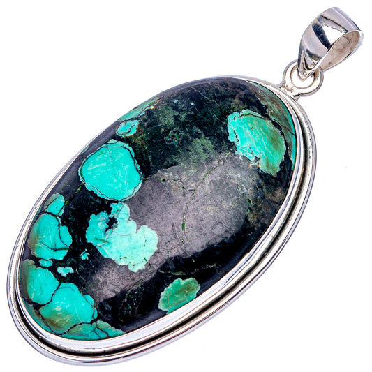 Turquoise oval pendant with .925 sterling silver bezel and top bail, black matrix
