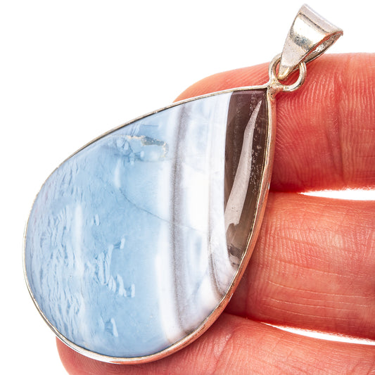 Blue teardrop opal pendant with silver plated bezel and bail